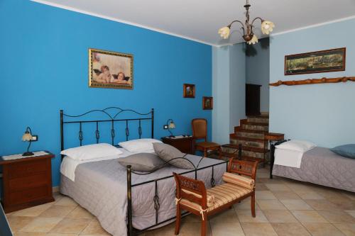 Ein Bett oder Betten in einem Zimmer der Unterkunft Agriturismo Casa Della Nonna