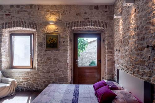 Ένα ή περισσότερα κρεβάτια σε δωμάτιο στο Holiday home in Medulin - Istrien 9341