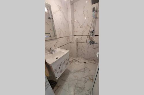 Koupelna v ubytování Луксозен апартамент с гледка към парк и топ център