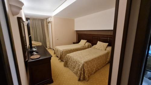 Katil atau katil-katil dalam bilik di Apartment Privat ApartHotel Alpin fara mic dejun si fara acces SPA