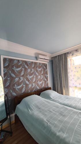 Postel nebo postele na pokoji v ubytování Gios Guest House