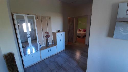 an empty room with a room with a bedroom at Apartment Tina in Briševo
