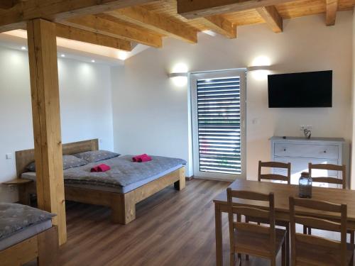 Postel nebo postele na pokoji v ubytování ANICO apartmány