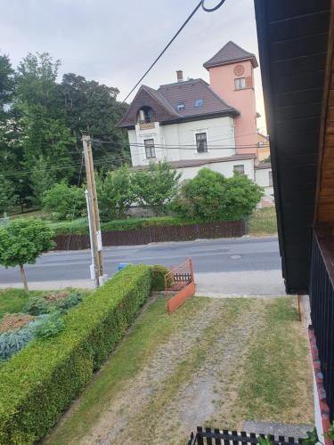 a view of a house from the porch of a house at Ubytování v rodinném domě in Hejnice