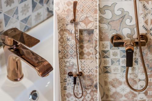 a bathroom with a shower and a faucet at Pokoje LotNik nad jeziorem in Mrągowo