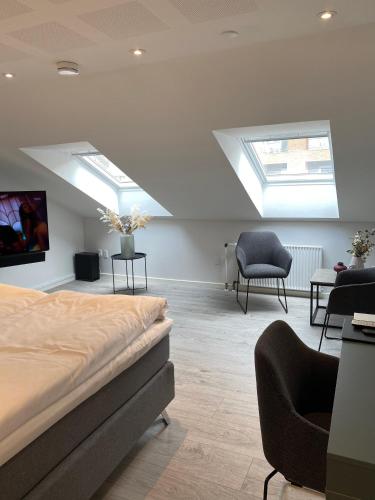 Ein Bett oder Betten in einem Zimmer der Unterkunft Hotel Røde-Kro