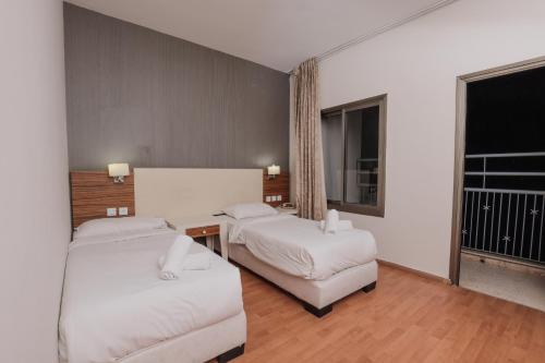 Tabar Hotelにあるベッド