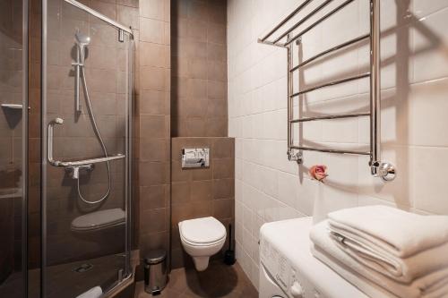 Um banheiro em Tulip Hotel Apartments