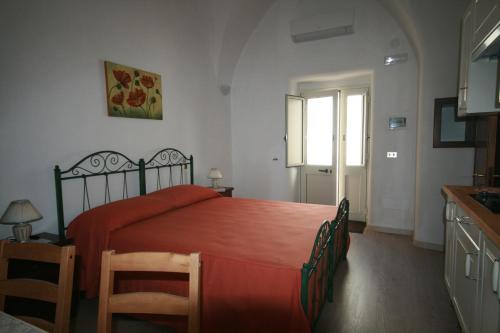 Säng eller sängar i ett rum på Santa Maria de Lu Trisciulu