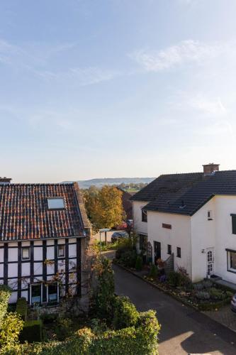 an aerial view of two houses and a street at Little India Vijlen appartement 2 in Vijlen