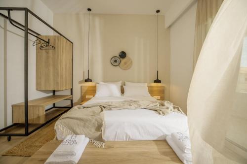 Ένα ή περισσότερα κρεβάτια σε δωμάτιο στο Casa Costa Suites