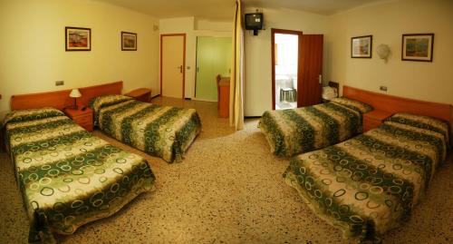 Ένα ή περισσότερα κρεβάτια σε δωμάτιο στο Hostal Santa Clara