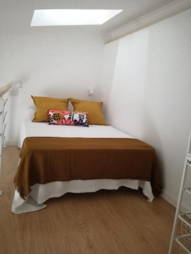 Voodi või voodid majutusasutuse Tiny House Faro toas