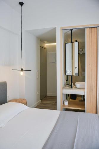 En eller flere senge i et værelse på Princess Mare Hotel - Adults Only