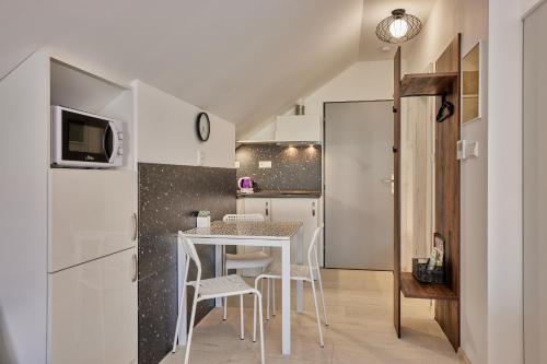 Apartmány Malenにあるキッチンまたは簡易キッチン