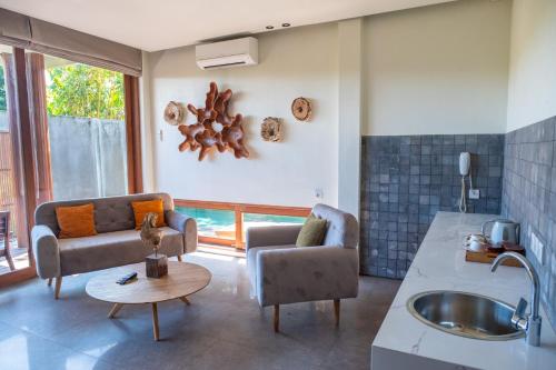 Tegal Sari Accommodation Ubudにあるシーティングエリア