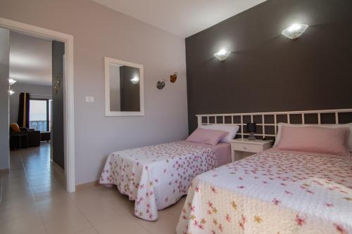 Postel nebo postele na pokoji v ubytování VV Norte y Sur