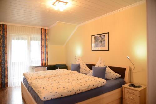 Postel nebo postele na pokoji v ubytování Ferienwohnung Haus Kotthoff