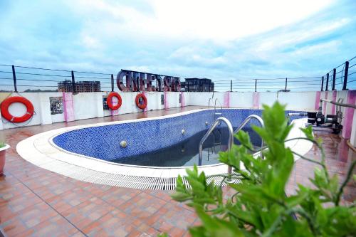 The swimming pool at or near Orchid Business Hotel