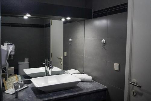 Koupelna v ubytování Hotel Prins van Oranje