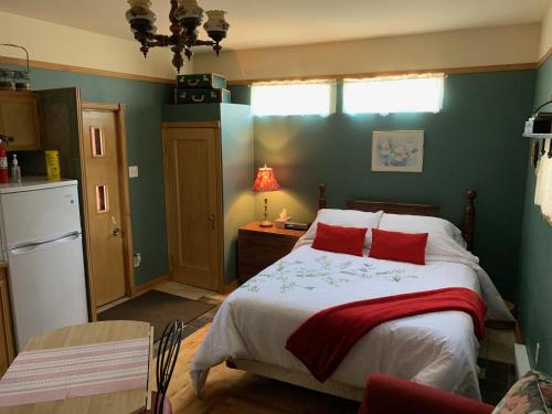 Ένα ή περισσότερα κρεβάτια σε δωμάτιο στο Chez Odette, loft intime