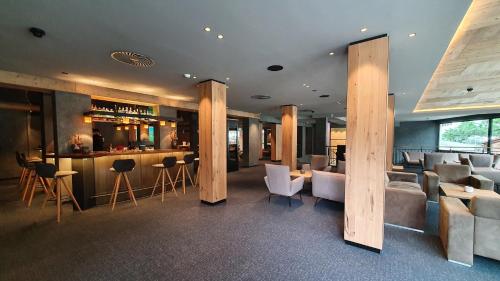 Restoran atau tempat lain untuk makan di Wellnesshotel Mein Almhof Superior