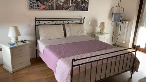 Postel nebo postele na pokoji v ubytování Room Saronno + B&B