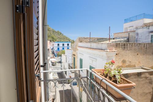 a balcony with a view of a city at Hotel Clelia in Ustica