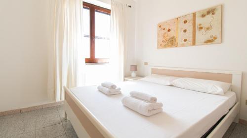 Postel nebo postele na pokoji v ubytování Casa Corbezzolo