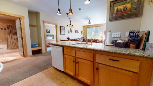 a kitchen with a sink and a counter top at Sunstone #208 Condo in Mammoth Lakes