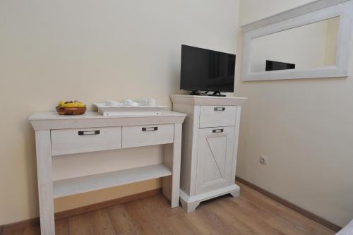 Μια τηλεόραση ή/και κέντρο ψυχαγωγίας στο BLISS HOUSE Oradea