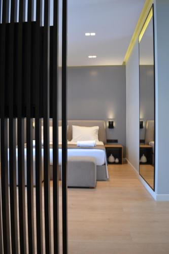 Katil atau katil-katil dalam bilik di ArtNest Luxury Hotel & Suites