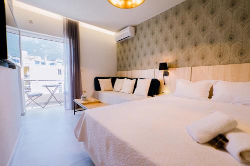 Ένα ή περισσότερα κρεβάτια σε δωμάτιο στο Loutraki hidden Gem II