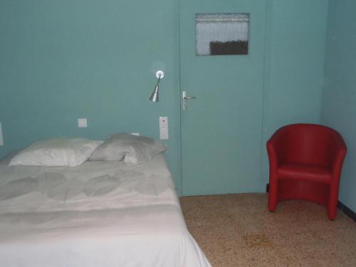 Een bed of bedden in een kamer bij Chez Baratier