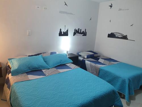 Cama o camas de una habitación en Casa Hotel Luna de Paso
