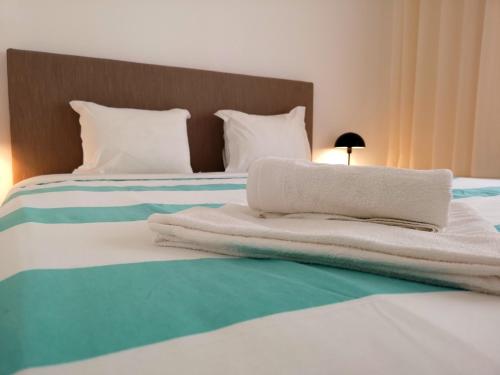 Кровать или кровати в номере Casa do Quico