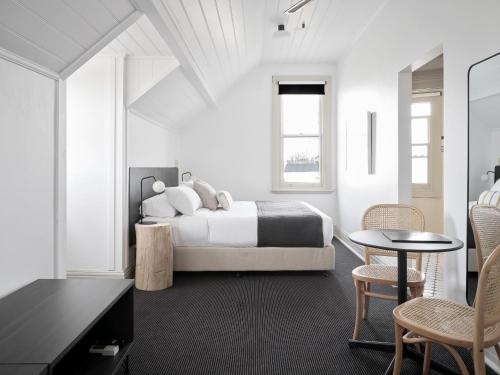 Postel nebo postele na pokoji v ubytování Dunkirk Hotel Pyrmont