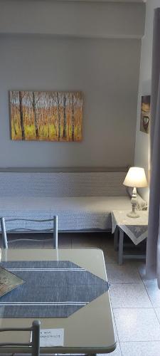 Гостиная зона в Bousounis Apartments