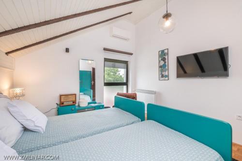 Postel nebo postele na pokoji v ubytování Villa Colapis