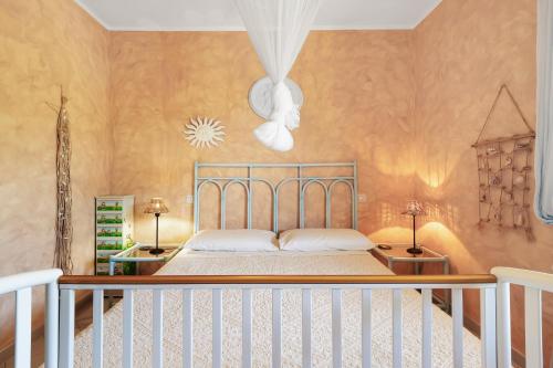 Postel nebo postele na pokoji v ubytování Casa Vacanze Nicola e Maria