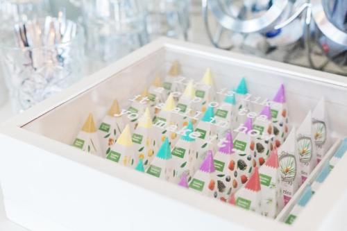 a white drawer filled with colorful origami castles at Hanze Hotel Zwolle in Zwolle