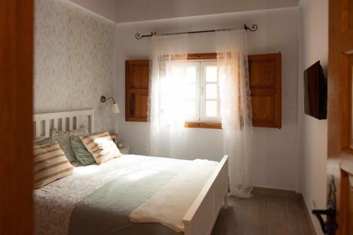 Ένα ή περισσότερα κρεβάτια σε δωμάτιο στο Apartamento la grajita