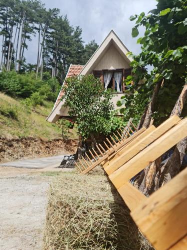 a wooden fence in front of a house at Miliceva ruza in Zlatibor