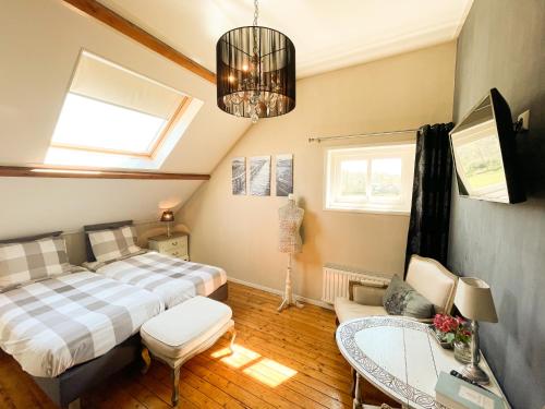 Postel nebo postele na pokoji v ubytování Oostmolenhoeve B&B