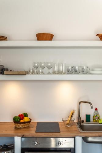 Η κουζίνα ή μικρή κουζίνα στο Miramare Suites Mykonos