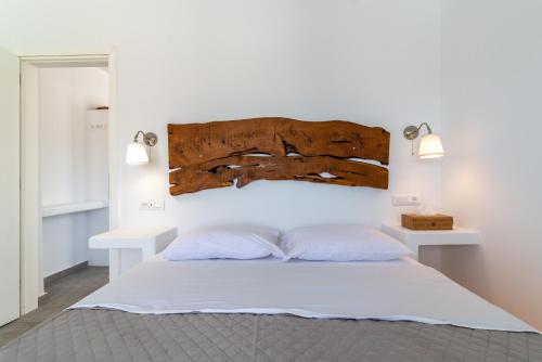 Ένα ή περισσότερα κρεβάτια σε δωμάτιο στο Miramare Suites Mykonos