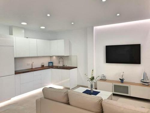 Kuchyňa alebo kuchynka v ubytovaní Apartamento Puerto Marina Beach