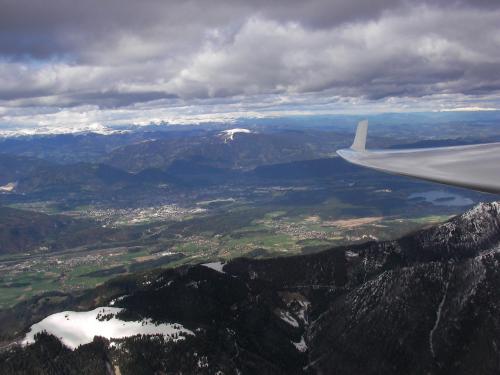 a view from the wing of an airplane flying over mountains at Ferienwohnung Andritsch in Sankt Georgen im Gailtal