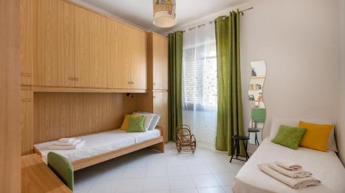 Кровать или кровати в номере Welcomely - La Casa di Annetta