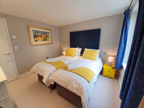 Ein Bett oder Betten in einem Zimmer der Unterkunft The Danbury, Lower Borough Walls